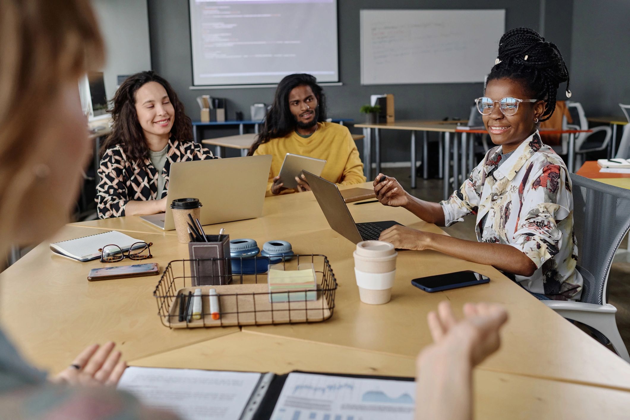 Office workers listening during a business meeting